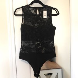 Lacy dynamite body suit